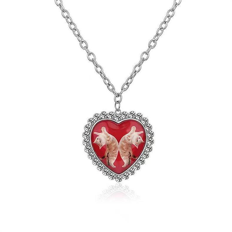 A Niche Design-forward Metal Pendant Necklace Featuring A Large Heart
